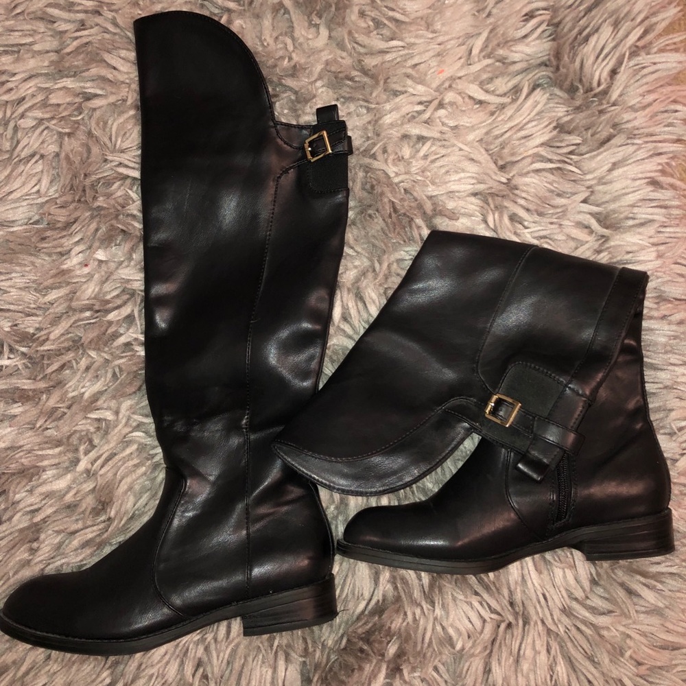 Over the knee black boots. Great condition.